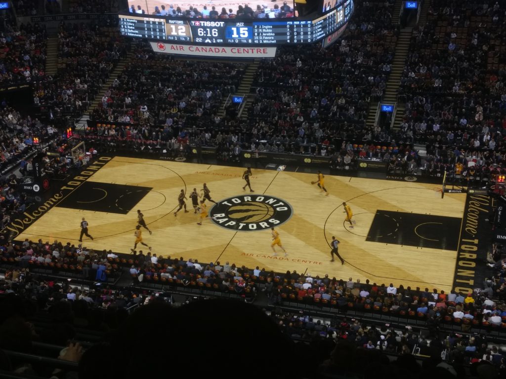 03-march-15-rec-game A far away shot of a basketball court in a full stadium