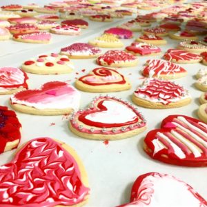 Decorated cookies in the shape of hearts.