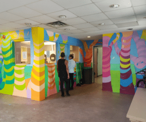 Completes mural, colourful trees