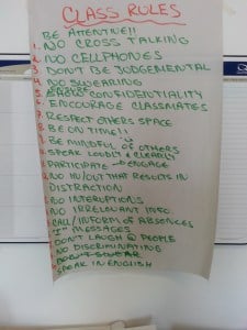 Class rules written out on a large sheet of paper.