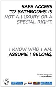 Sign reads: Safe access to bathrooms is not a luxury or special right. I know who I am. Assume I belong.