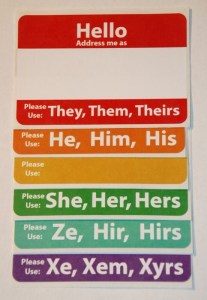 Hello name tag stickers with various pronouns.