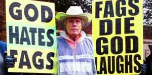 Someone holding sign that reads